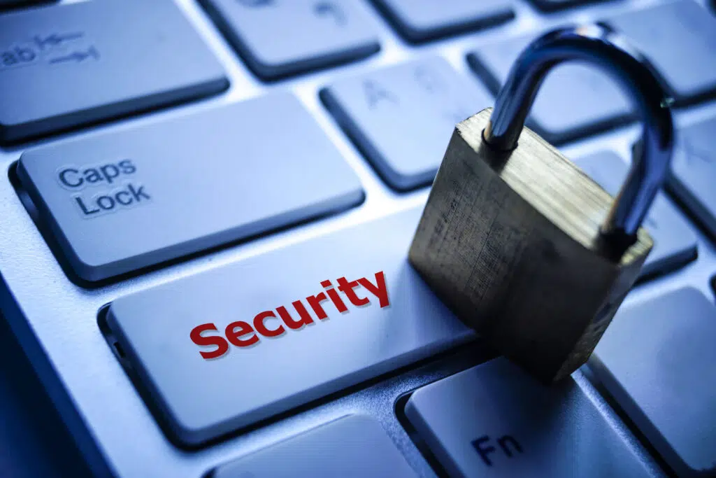Depiction of security of passwords showing lock on top of a computer keyboard.